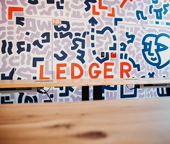 Graffiti design wall with the word ledger within the pattern